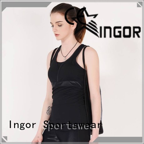 Inger Lycra Yoga Tops con diseño de espalda cruzada para niñas
