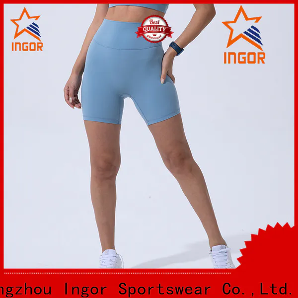 new women's mid length shorts  running in bulk at the gym
